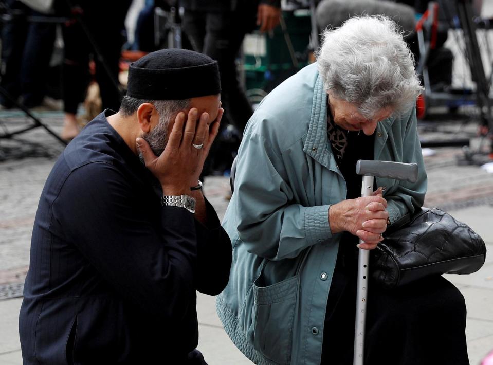  The pair united in prayer and grief at the square today following Monday's horrific attack