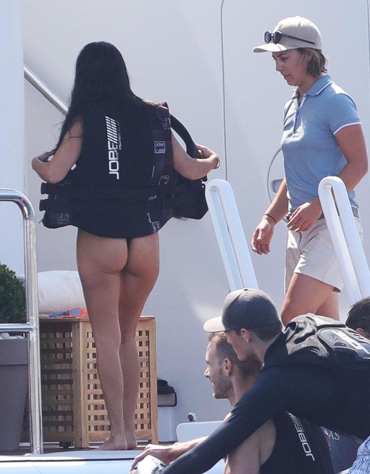  Kourtney Kardashian gave snappers a flash of her bare bum as she prepared to get on her jet ski