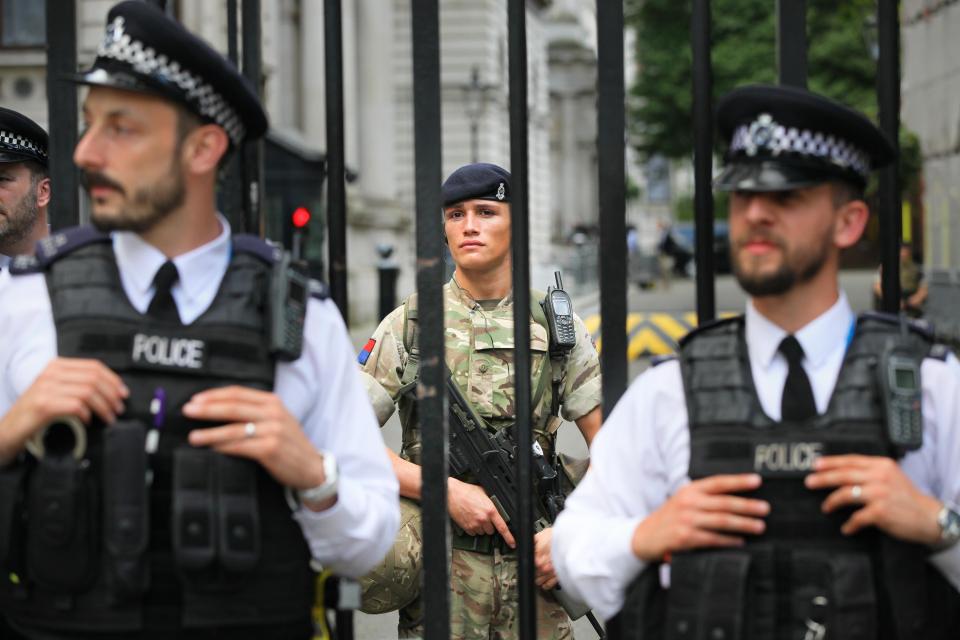 Soldiers join police officers at Downing Street in Westminster, London, as armed troops have been deployed to guard "key locations" under Operation Temperer, which is being enacted after security experts warned the Government that another terrorist attack could be imminent