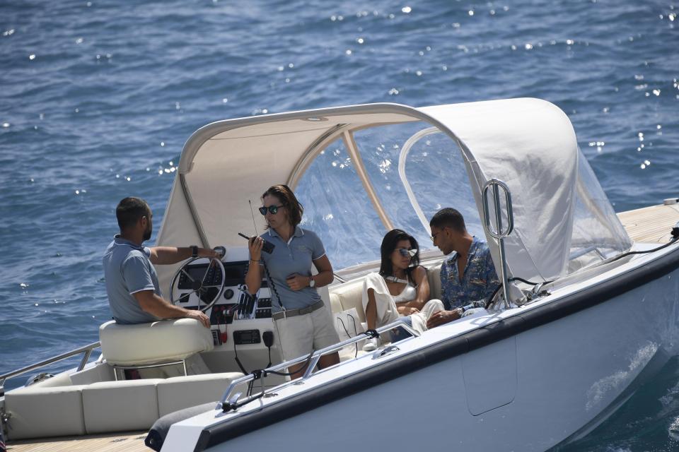  The pair looked lovingly at one another as the boat sailed across the sea