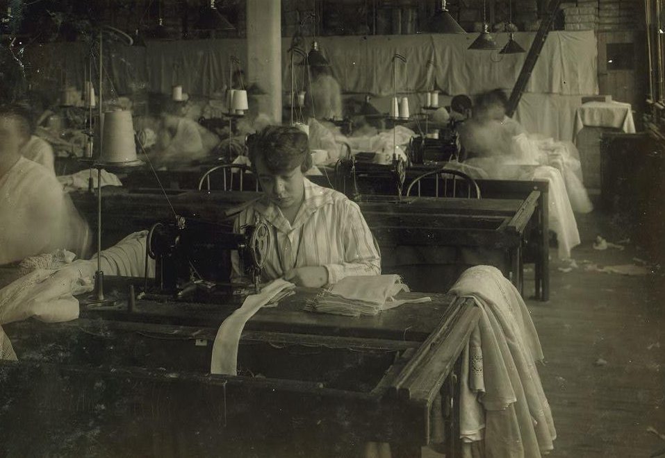  Bessie Blitch, aged 15 years old, sewing curtains on machine at Boutwell, Fairclough & Gold in Boston in 1917