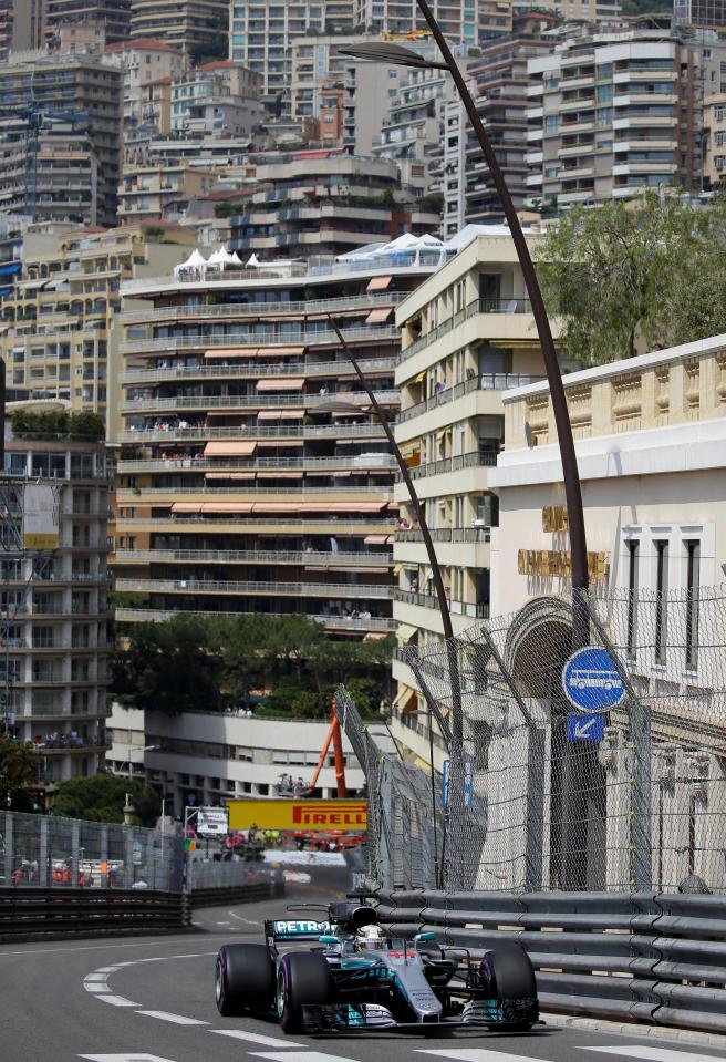  Lewis Hamilton speeds through the winding streets of Monaco