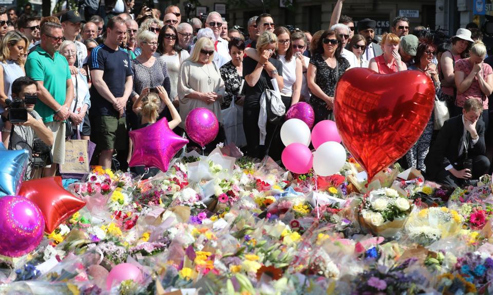  Visitors to St. Ann's Square joined the nation in falling silent for a minute at 11 o'clock