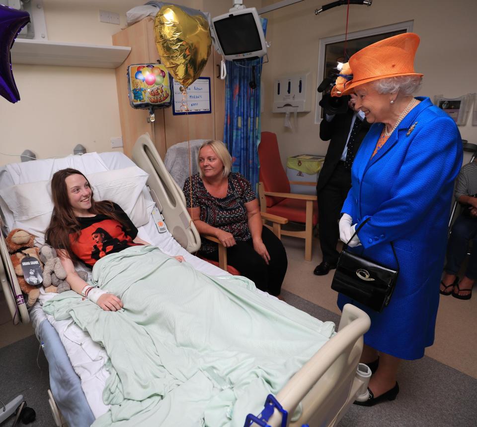  The Queen meets Millie Robson, 15, from Co Durham, and her mother, Marie at Royal Manchester Children's Hospital today