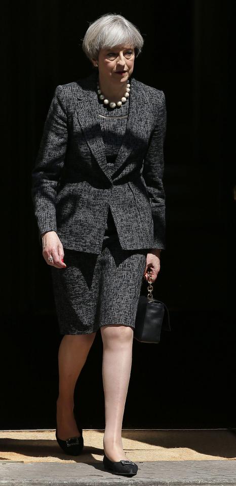 Britain's Prime Minister Theresa May leaves 10 Downing Street in central London earlier today