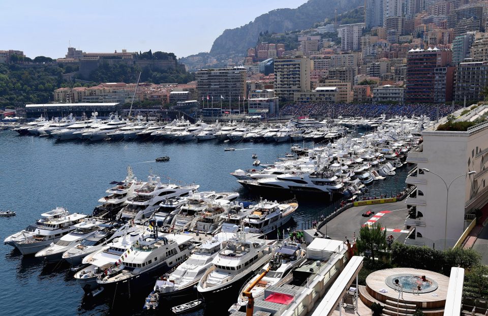 Giant super-yachts line the harbour