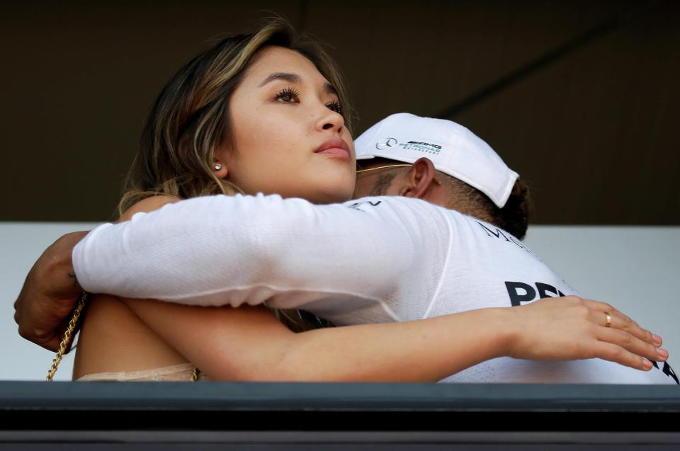  Lewis Hamilton greets a friend after the day's second practice session on Monaco