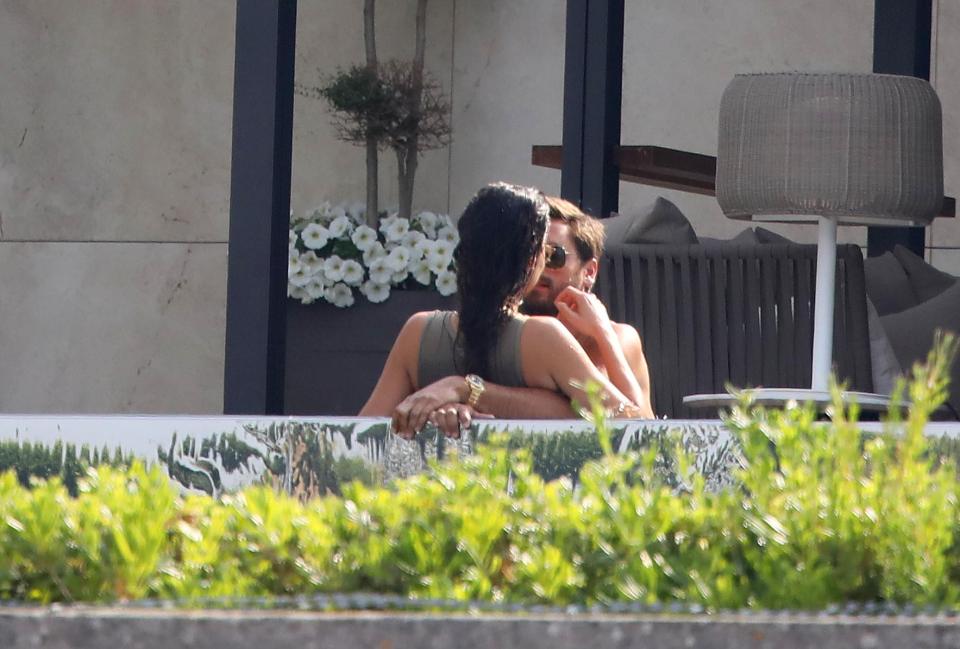  The 34-year-old couldn't keep his hands off celeb stylist Chloe Bartoli, 26, as they relaxed in the pool