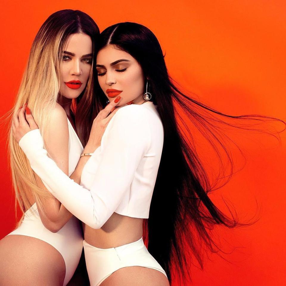  Khloe and Kylie sex it up for the camera to promote 19-year-old's clothing line