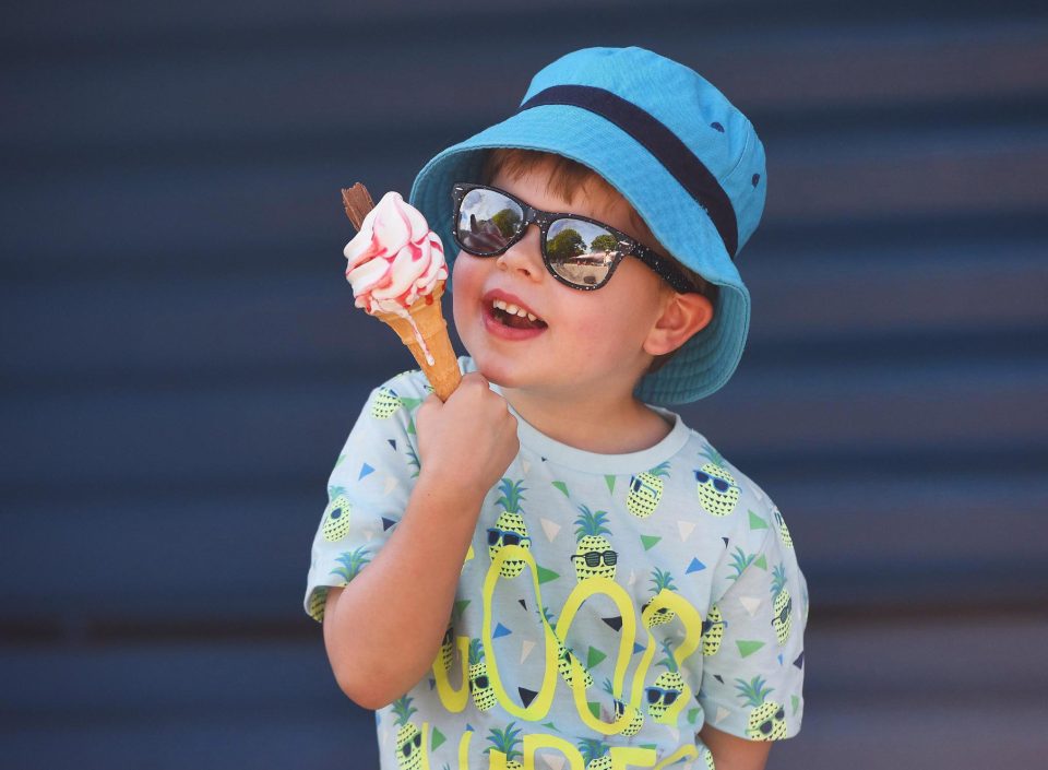  Benji Waite, three, cools down with an ice-cream at Paultons Park near Southampton on Friday