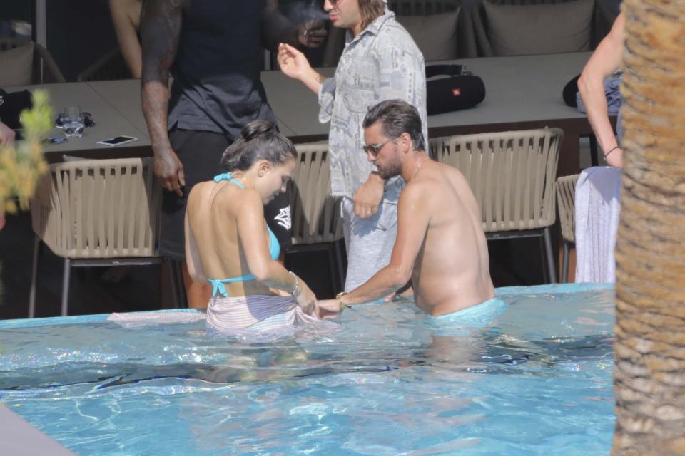  Scott and Maggie shared a laugh as they hung out in the pool