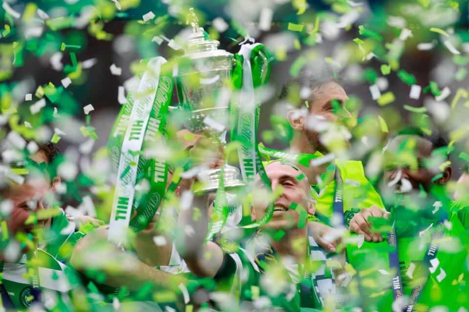  Green confetti was in the air as Celtic lifted the trophy