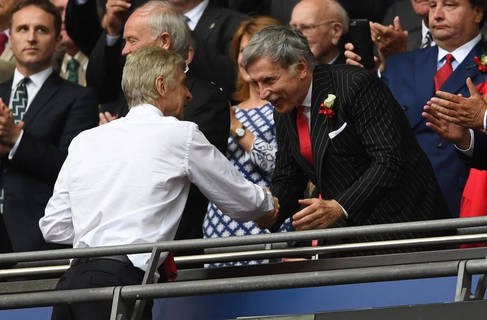  Arsenal boss Arsene Wenger and club owner Stan Kroenke shake hands after the Gunners triumphed over Chelsea in the FA Cup final