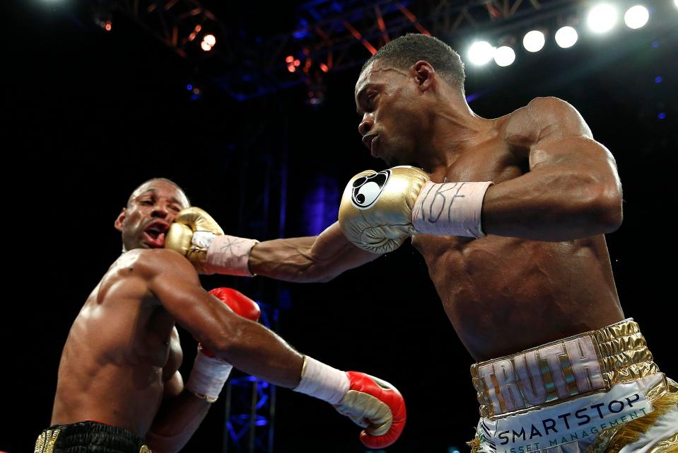 Errol Spence Jr connects with a right as Kell Brook loses his world title clash