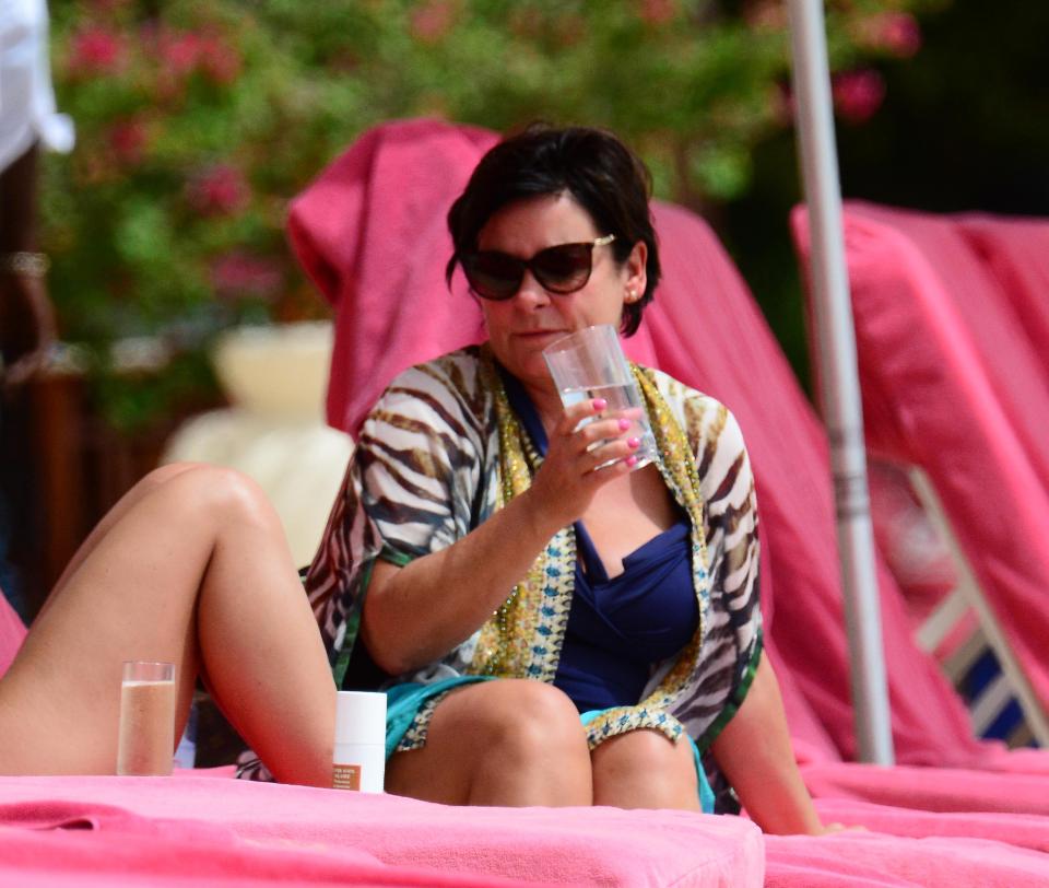  Coleen's mum Colette remained in the comfort of her sun lounger