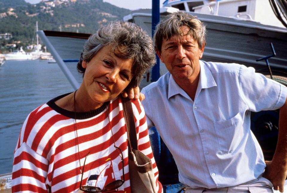  John pictured on holiday with his wife in July 1990