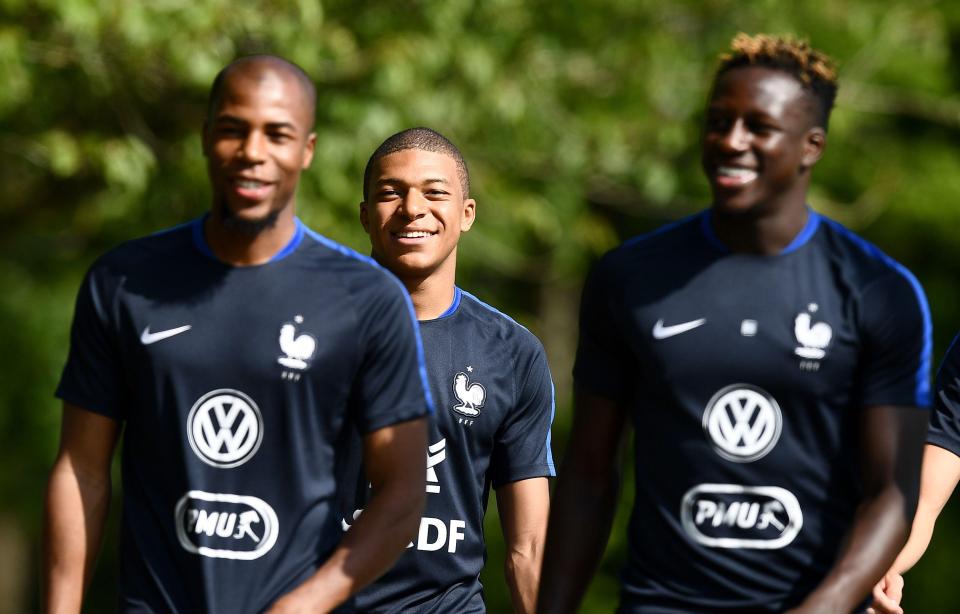  Monaco's Kylian Mbappe , pictured centre with Djibril Sidibe, left, and Benjamin Mendy, right, is another red-hot striker who is rumoured with a move this summer