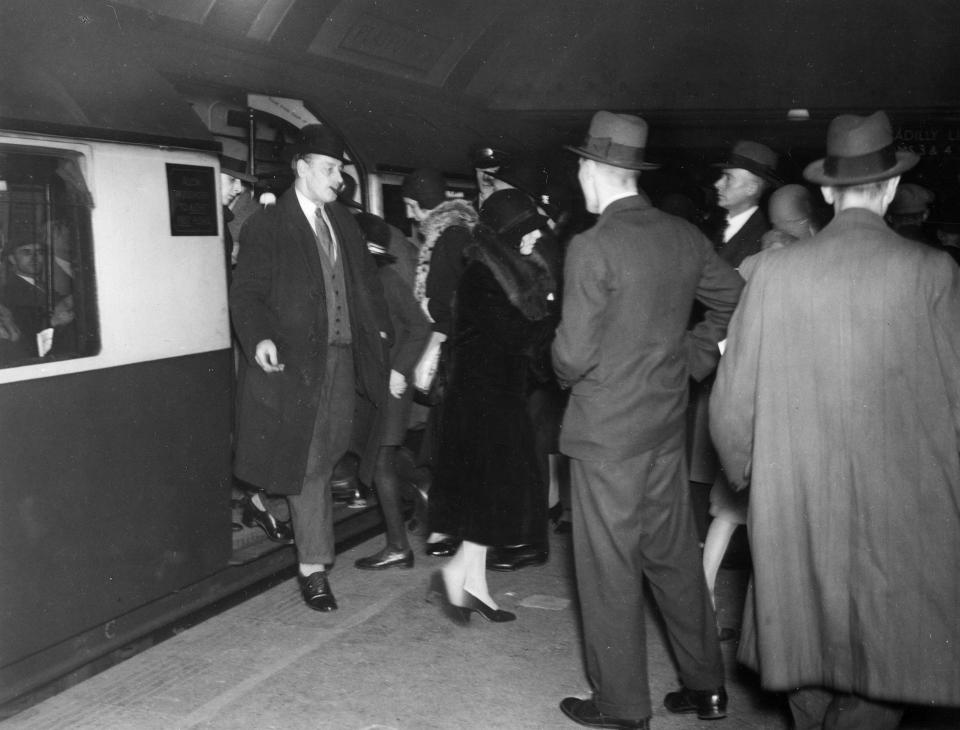  Rush hour passengers on a platform at Piccadilly Circus underground station in 1933