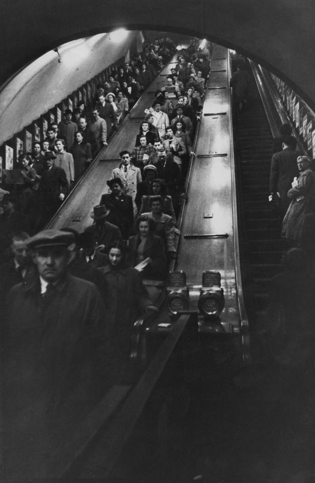  Rush hour passengers on an escalator at Piccadilly Circus underground station in January 1951