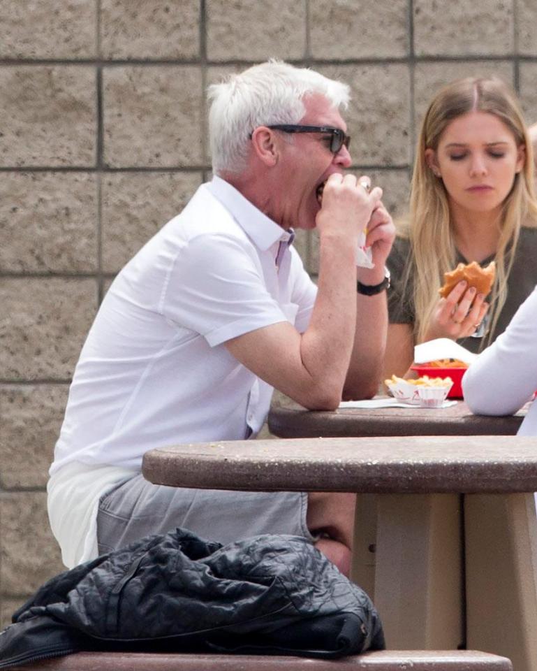  Phillip Schofield was spotted stuffing his face with an In N Out burger on holiday in America