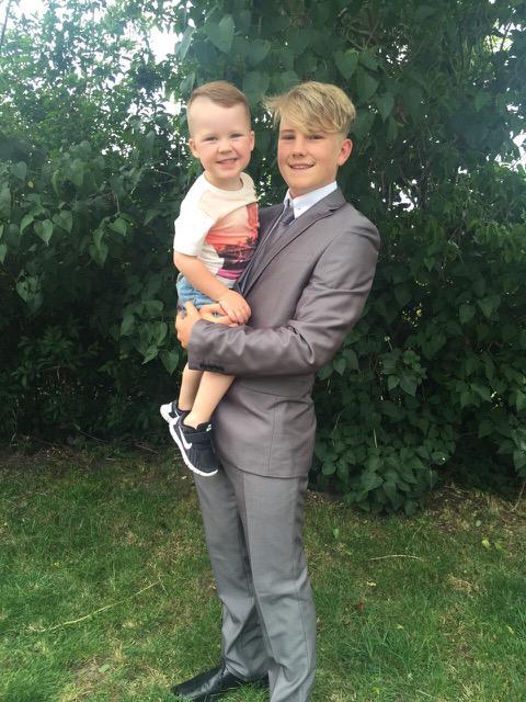 Shea, pictured aged 16 with his nephew Camden, 4, had dropped out of his college carpentry course and had been rowing with his mum for a couple of years