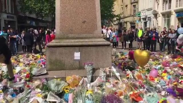  Mourners leaving floral tributes and messages following Manchester terror attack