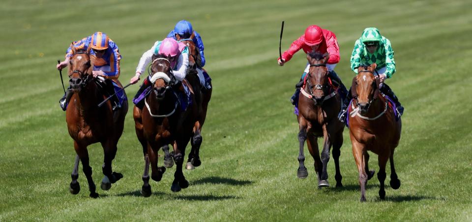  Custom Cut (green silks, right) wins the The Ard Glen Construction Amethyst Stakes at Leopardstown