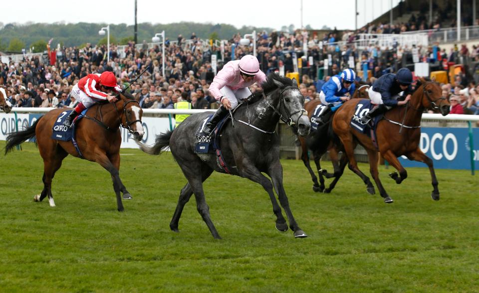  Winter (centre, pink silks) wins the 1,000 Guineas at Newmarket