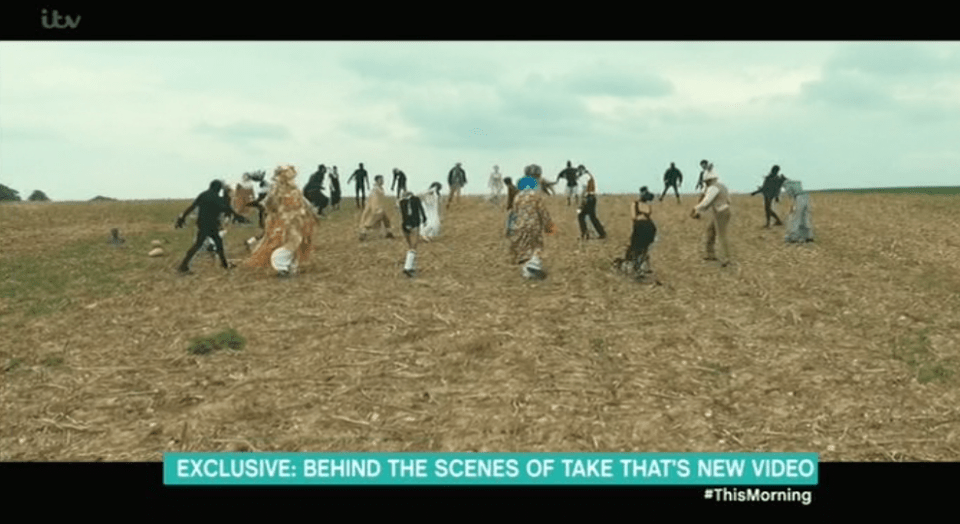  They find him in a field surrounded by the most bizarre zombies