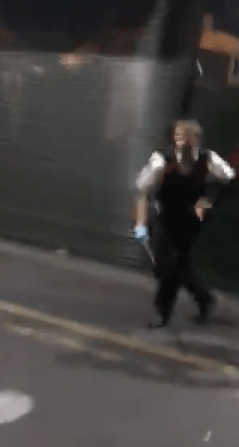 An officer can be heard reassuring a victim as they run through Borough Markets