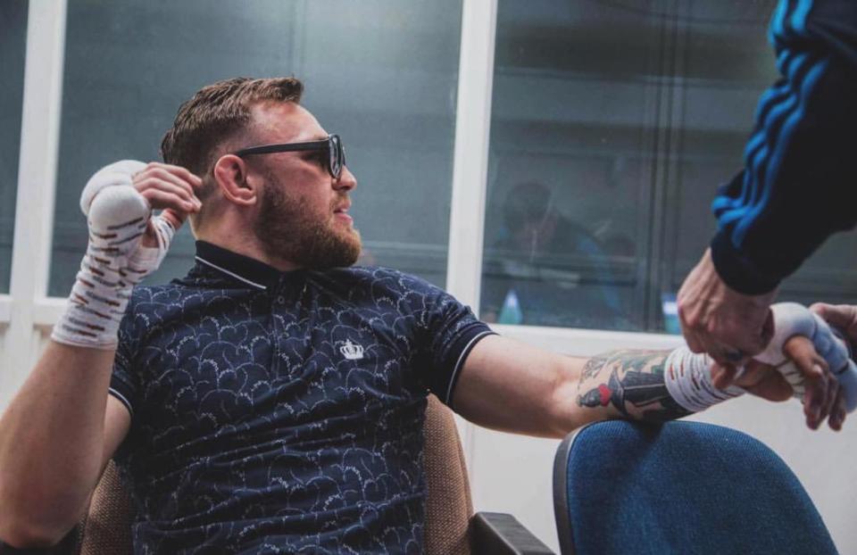  Conor McGregor got his hands wrapped for a heavy gym session ahwead of his Floyd Mayweather fight