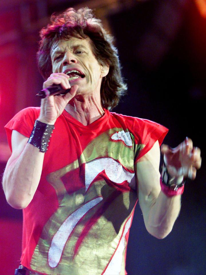  The legacy has survived for decades with the iconic band still touring - Mick seen here performing in 2003