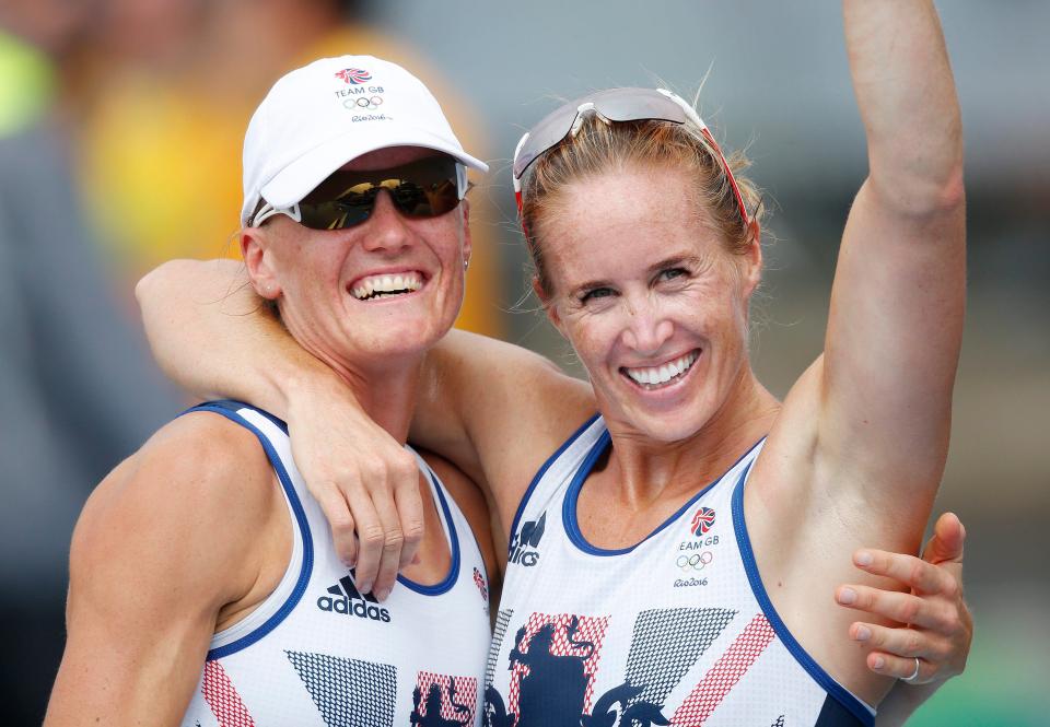  Glover (right) celebrates her Olympic gold with Heather Stanning