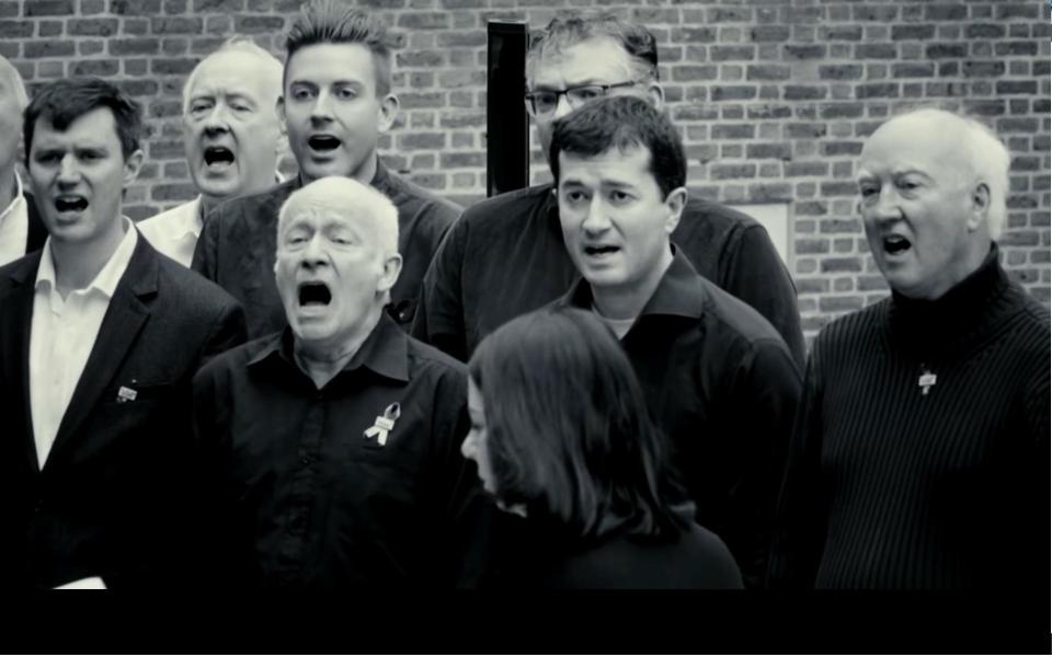  Peter Boxell (left front) joins Peter Lawrence (far right) in practice with the rest of The Missing People Choir