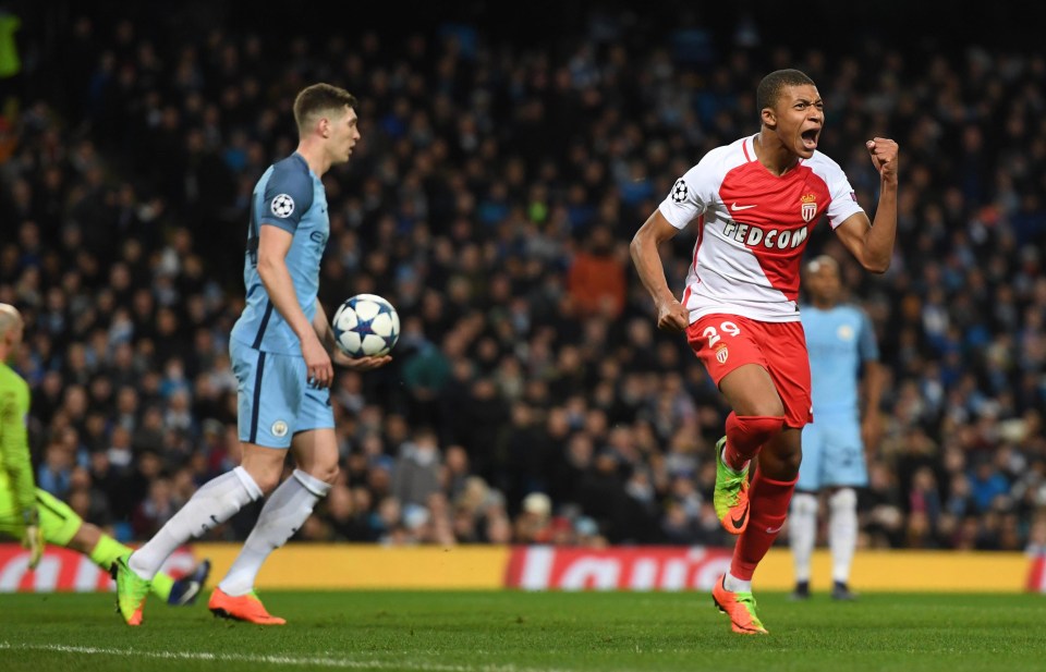 Kylian Mbappe celebrates after scoring against Manchester City