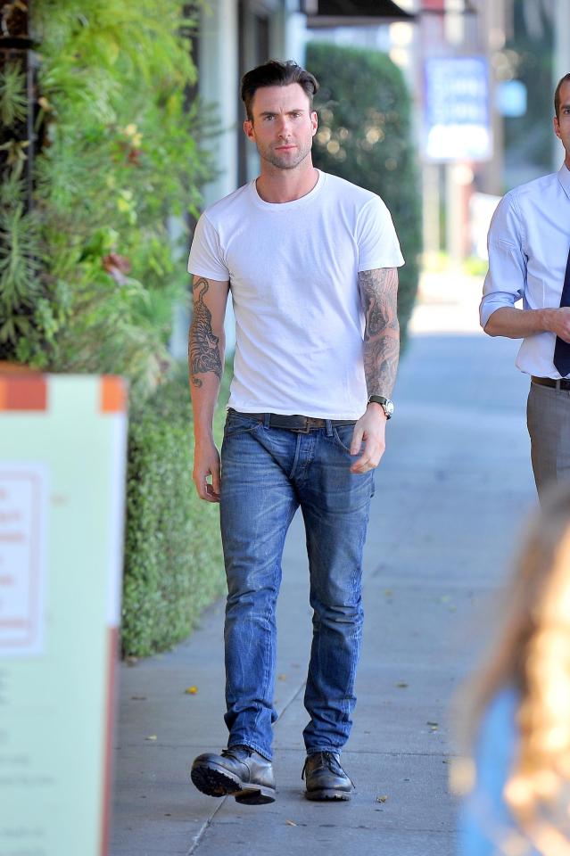  Adam Levine's sleeve includes the word 'mum'... but it's the wrong way up