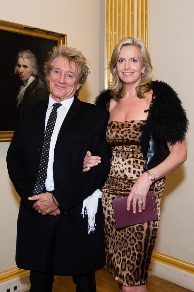 Rod Stewart, left, with wife Penny Lancaster, right