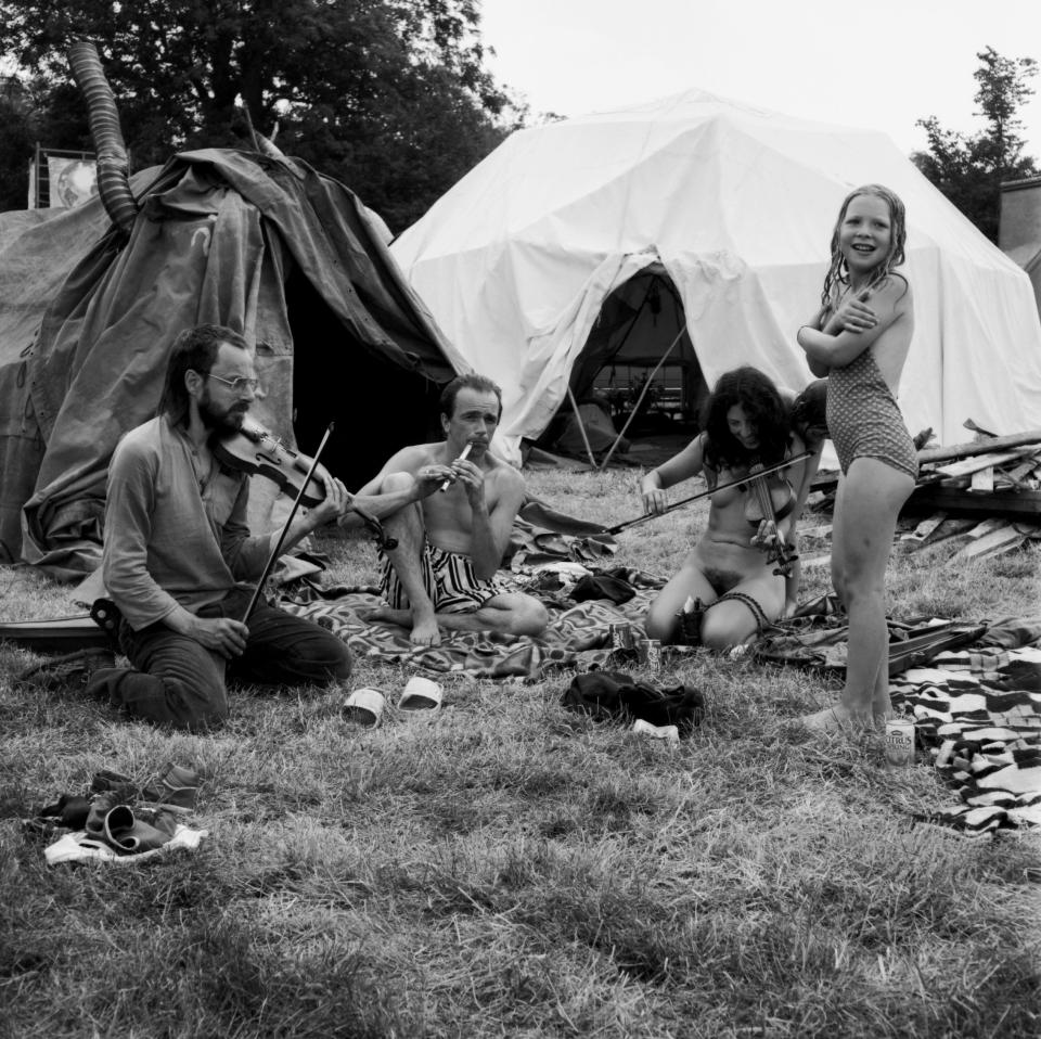  Another shot from 1989 shows a a musical family enjoying some downtime. The festival raised £100,000 for the Campaign for Nuclear Disarmament