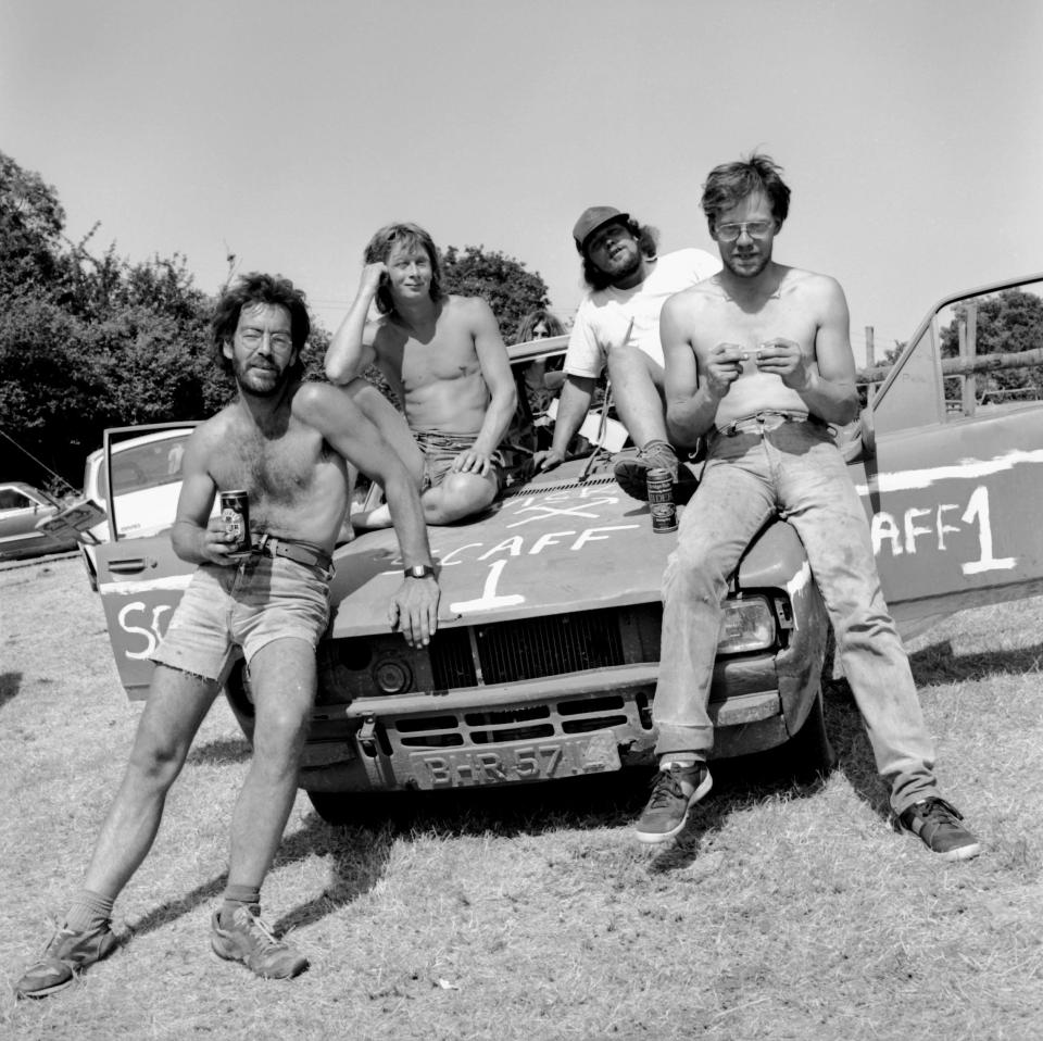  A snap from 1989 shows a group of friends chatting and smoking on the bonnet of a car. Complications over festival licencing with the local council led to the police being brought in to organise and plan the festivities