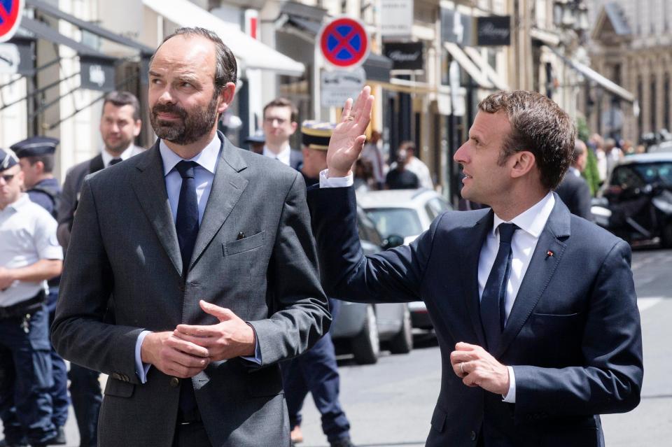  Prime Minister Edouard Philippe walks with President Emmanuel Macron following the pair's victory last month. This morning he said the election result would not affect Britain's desire to leave the EU