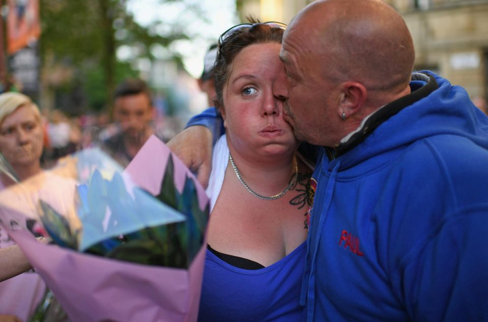  Charlotte, pictured with her partner Paul Hodgson, pictured at a memorial event held in memory of the Manchester terror attack victims