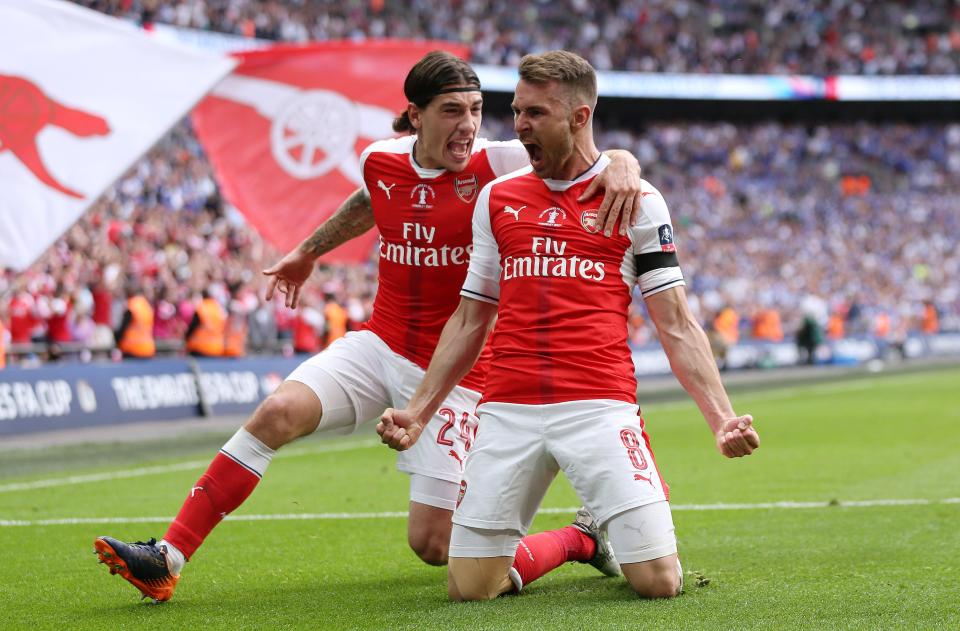  Aaron Ramsey and Hector Bellerin celebrate the Welshman's winner in the FA Cup final