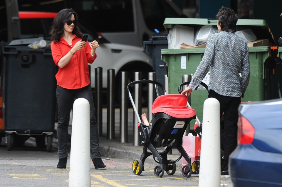 Ronnie pauses for wife Sally Humphreys to take a snap with Gracie Jane and Alice Rose