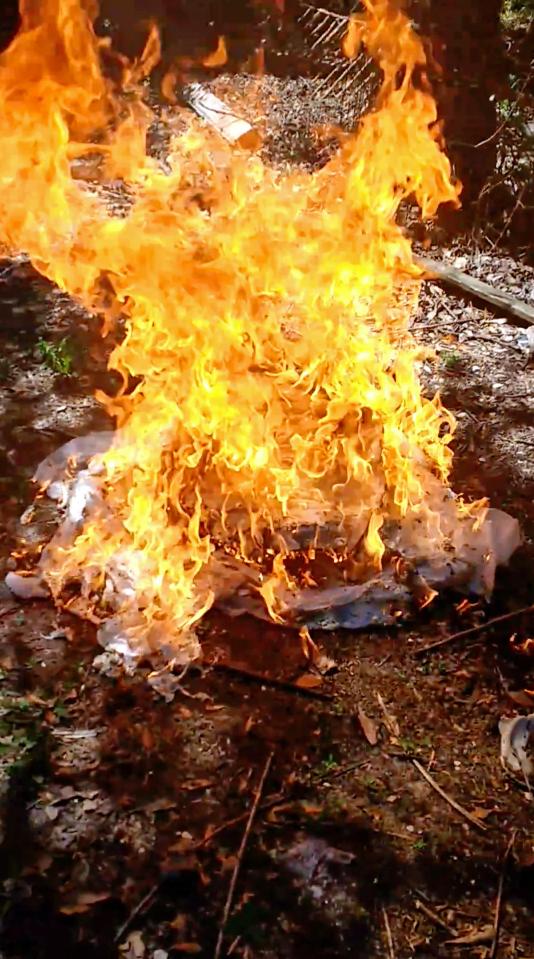  As the dress was set ablaze, Khristella shouted as she filmed the fire, "burn, baby burn"