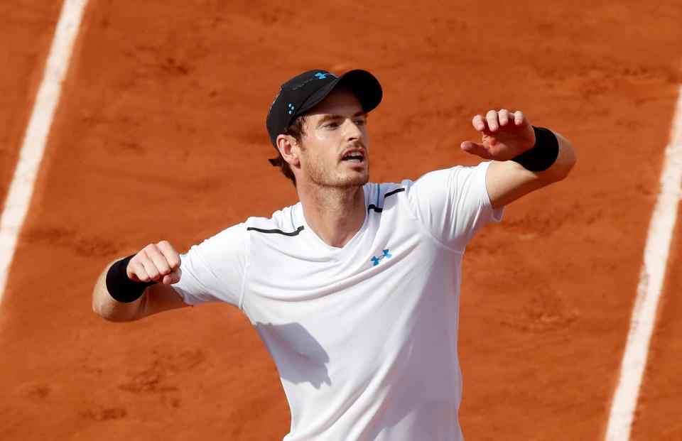  Andy Murray celebrates getting through to the French Open third round