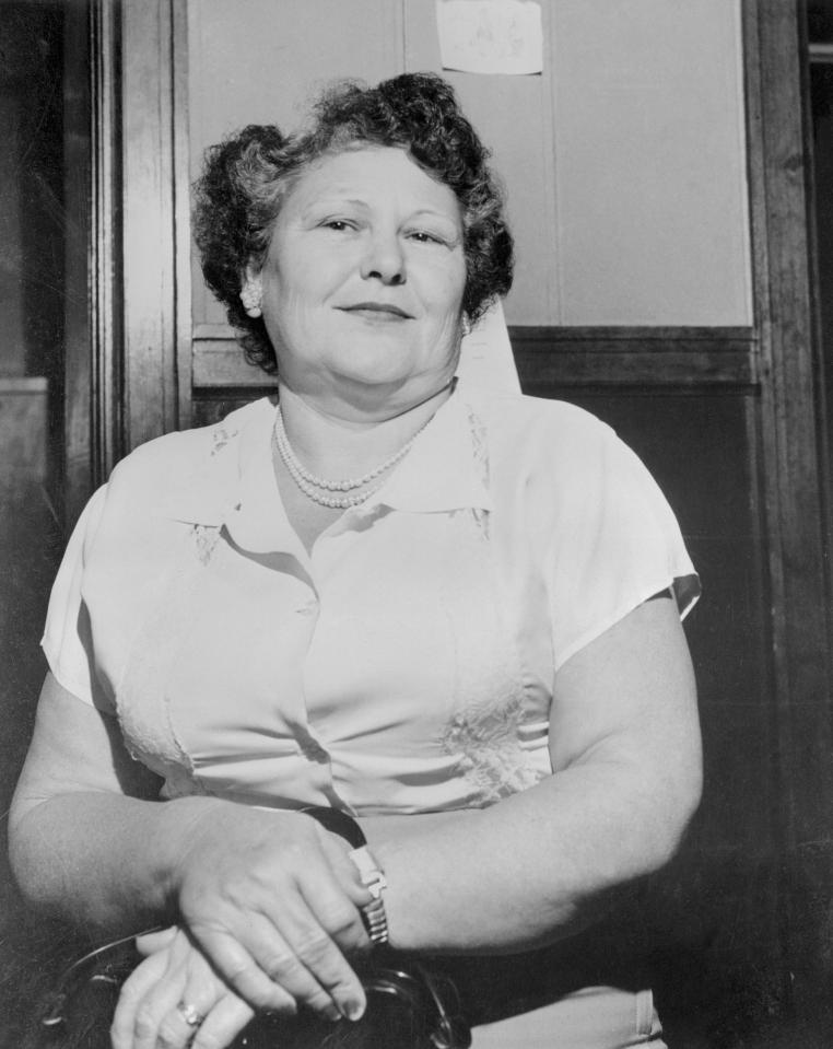  Nannie Doss gives a trademark grin. The American serial killer was convicted of poisoning 11 members of her own family