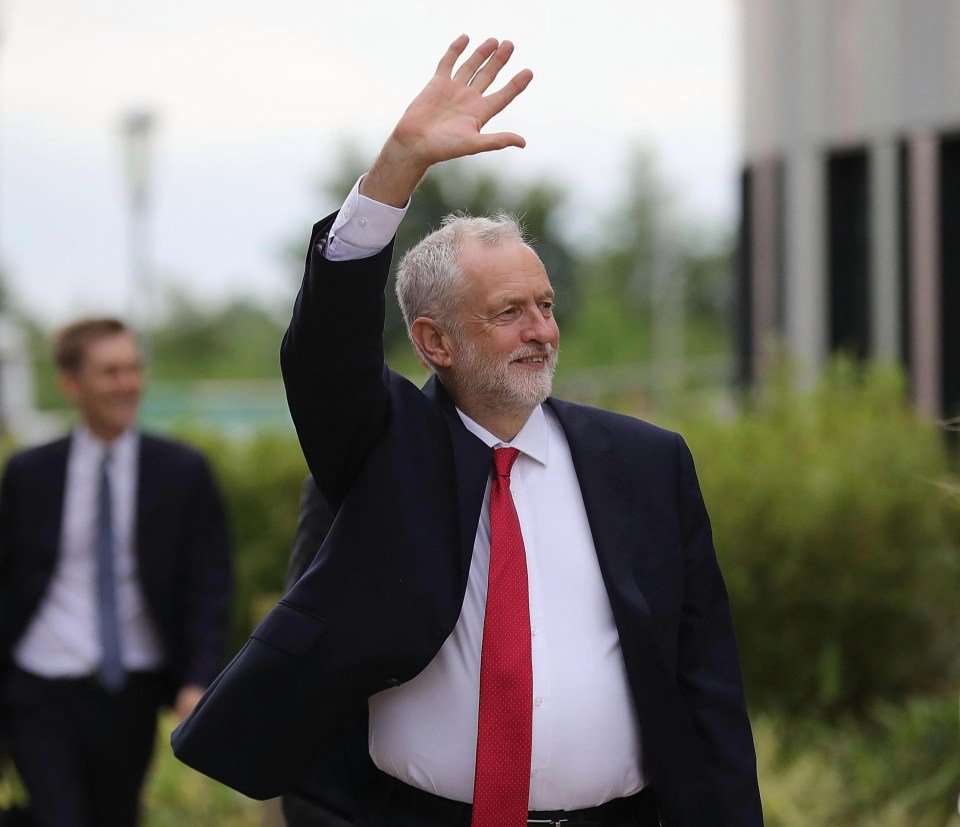 Jeremy Corbyn waved cheerfully to the protesters