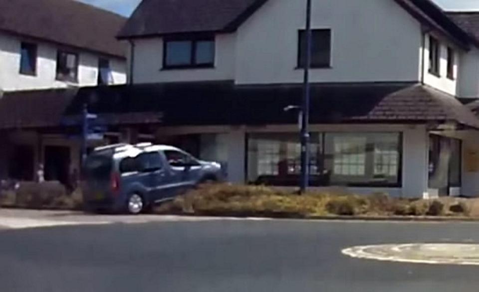  The car then ploughs into the estate agents window, wrecking the car in the process