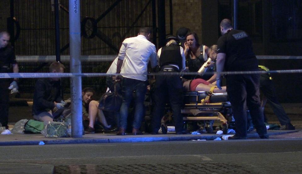  A victim being treated on a stretcher following the terror attack on London Bridge