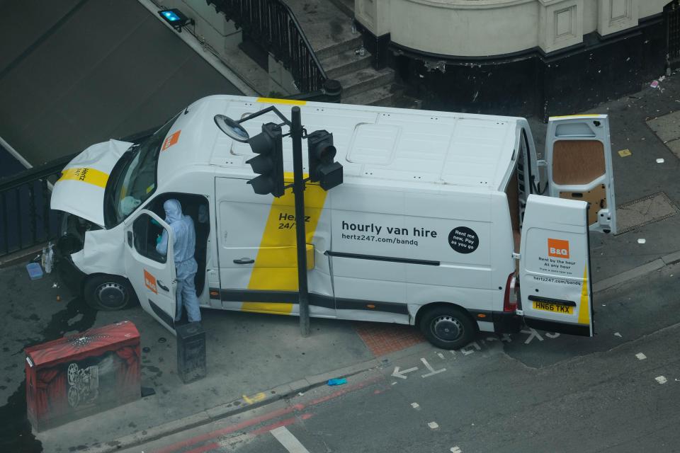  What looks like bottles with rags at the top can be seen at the front of the vehicle